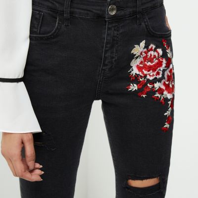 Black ripped floral super skinny Amelie jeans